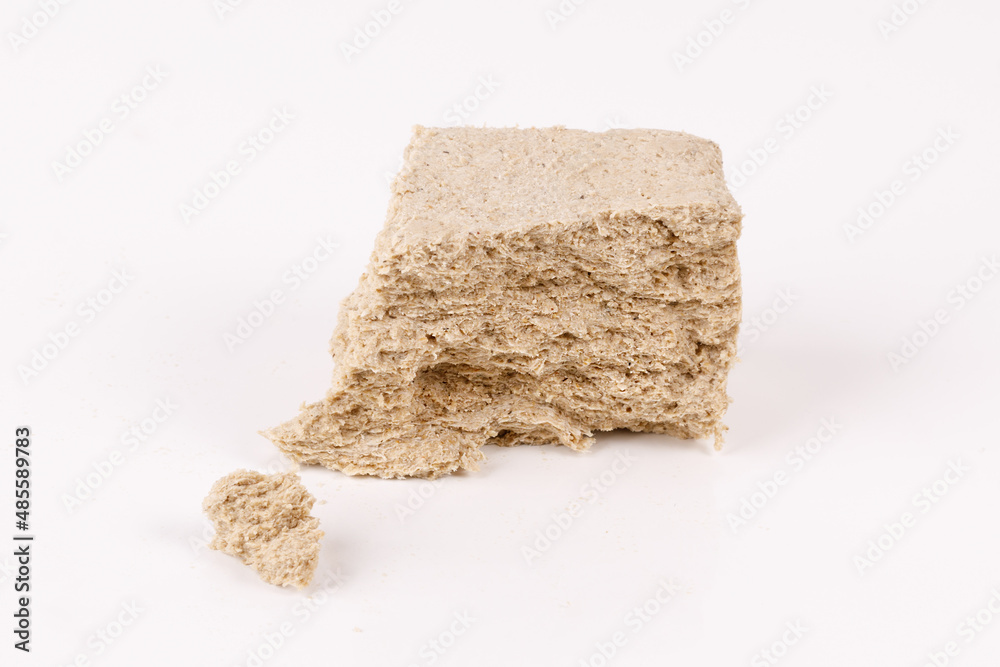 Poster halva with crumbs on white background