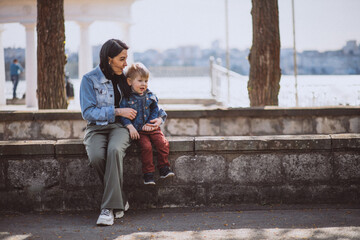 Mother with her little son in park