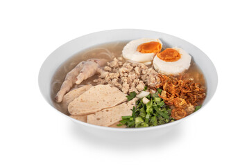 asian style rice noodles soup with herbs in a bowl