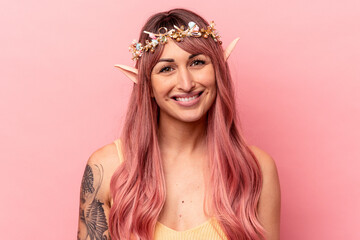 Young caucasian elf woman isolated on pink background happy, smiling and cheerful.