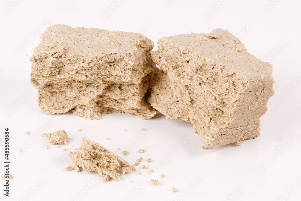 Poster halva with crumbs on white background