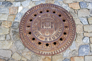 Český Krumlov, manhole on the sidewalk
