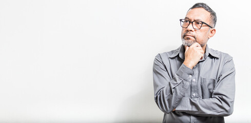 Businessmen contemplating marketing, finance, and banking plans to make investment decisions in...