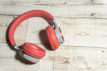Headphones wifi system on wooden floor
