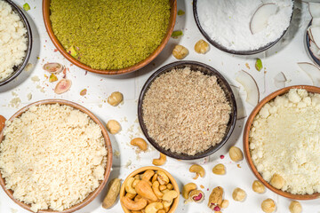 Alternative nut flour. Various keto paleo gluten, grain free flour source set, natural nut-based vegan baking. Almond, coconut, brazil nut, macadamia, walnut, cashew, pistachio, hazelnut, peanut flour