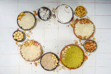 Alternative nut flour. Various keto paleo gluten, grain free flour source set, natural nut-based vegan baking. Almond, coconut, brazil nut, macadamia, walnut, cashew, pistachio, hazelnut, peanut flour