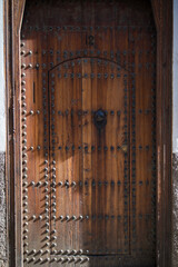 Marrakesh, Morocco - February 28, 2018 : Old Decorative Main Entrance Wooden Door.