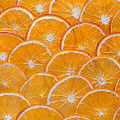 Lots of dried orange slices. Food background. Fruit chips