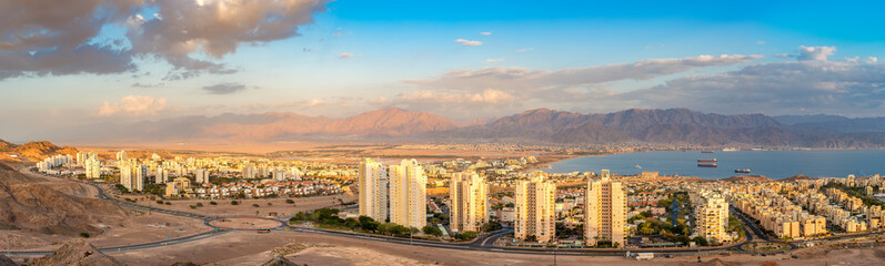 Obraz premium Eilat and Aqaba are famous resort cities with thousands relaxing tourists from around all the world