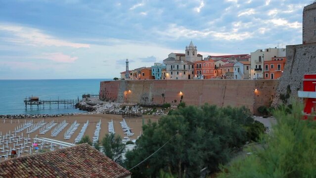 Fantastic summer view of Sant'Antonio beach. Colorful morning cityscape of Termoli port. Dramatic sunrise on Adriatic sea. Traveling concept background. Full HD video (High Definition)..