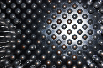 Close-up of nails, metal sheet with nails Nails texture background hammered into metal. Hats with nails. abstraction, steel self-tapping screws, metal screw, iron screw, screws as a background