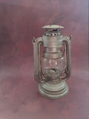 Old metal oil lantern, isolated. 