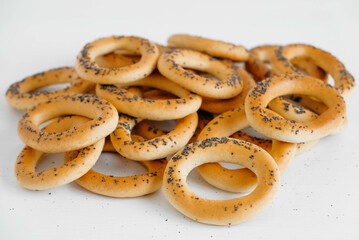 Dried bagels with poppy seeds on a white background