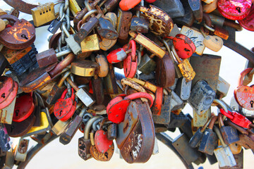 Locks of love, Valentine's Day or wedding day. Locks with a lock of love on the bridge, locks (symbols of love for love. new romantic attraction on the boardwalk Novosibirsk, Russia, August 25, 2021