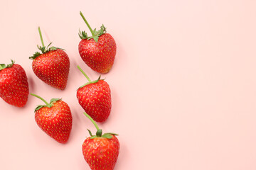 Top view of sweet red strawberry with leaf on isolated background