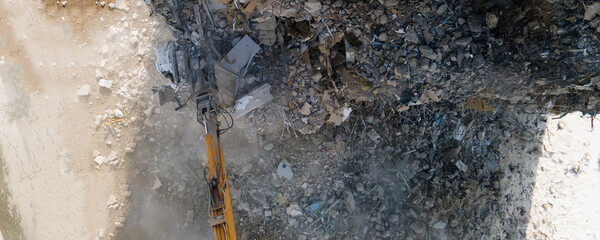 Excavator with Hydraulic Shears in action, building demolition - obrazy, fototapety, plakaty