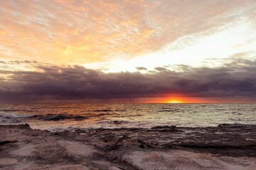 Fototapeta na wymiar Morning sunrise view of ocean at Orange rocks in Uvongo, East coast of South Africa 