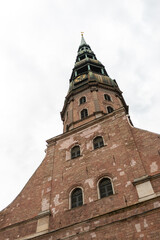 Fototapeta na wymiar St. Peter Cathedral in Riga, historic architecture building. Travel in Latvia and Baltic countries.
