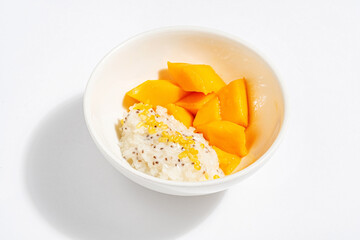 .Thai style sticky rice with banana cream and mango
