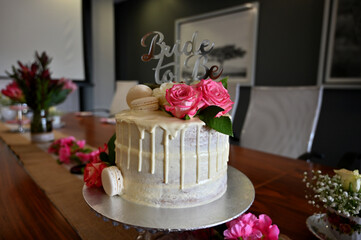 Bride to be Cake with beautiful frosting and lush roses as decoration with a 