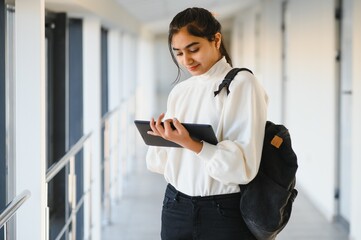 beautiful indian university student. The concept of higher education.