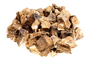 pieces of dried chicory roots close up isolated