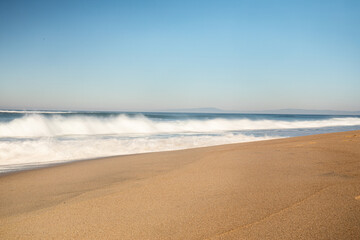 Fototapeta na wymiar waves crashing on California shoreline 