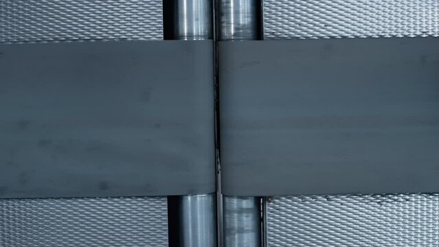 Closeup empty conveyor belt moving at modern automated manufacturing facility