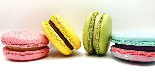 Cakes macaroons. Cookies macaroons. Bright tasty cakes. Multicolored cakes and cookies. Sweet background.
