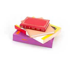 Stack of red, yellow and pink books isolated on a white background