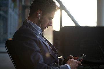 Man sitting in a waiting area going for job interview