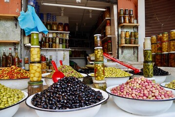 Olive stall at the food market in the Medina of Marrakech, Morocco.