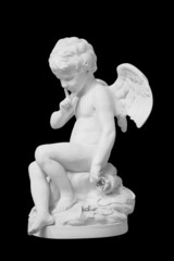Cupid statue decorated. Angel sculpture on black background with clipping path