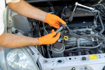 Ignition or spark coil replacement. Repairing of vehicle.