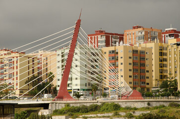 Cable-stayed bridge over a ravine and buildings. La Feria del Atlantico. Las Palmas de Gran...