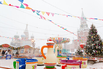 Moscow, Russia, February 7, 2022, Winter Fair and Carousel . Poor visibility due to snowfall on Red Square. 