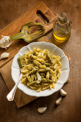 Fototapeta premium pasta with sauteed artichoke garlic and olive oil