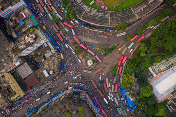 Aerial view of a busy roundabout in financial district of Dhaka with traffic in Dhaka downtown, Bangladesh.