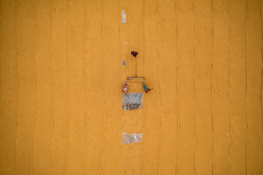 Aerial view of people working in a rice mill, Brahmanbaria , Bangladesh.