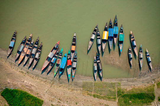 Aerial view of traditional fishing boats along the shoreline on the beach on St. Martin's Island, Teknaf, Chittagong, Bangladesh.