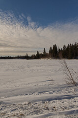 Frozen Astotin Lake on a Partially Cloudy Winter Day