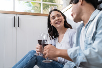 Asian young new marriage couple spend time together in kitchen at home. 