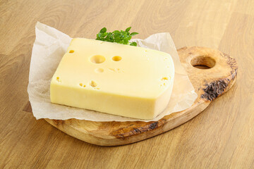 Maasdam cheese over the board