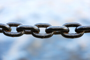 an iron chain. Close-up, the concept of strength, mutual assistance.