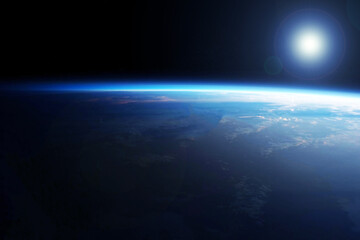 Dawn over the earth from space. Elements of this image were furnished by NASA