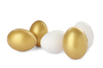 Golden eggs among ordinary ones on white background