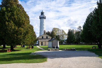 Door County, Wisconsin -  Tourists visit and enjoy the grounds of the Cana Park Lighthouse