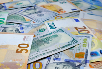 Money. Euro and us dollars banknotes. Background of dollars and european currency