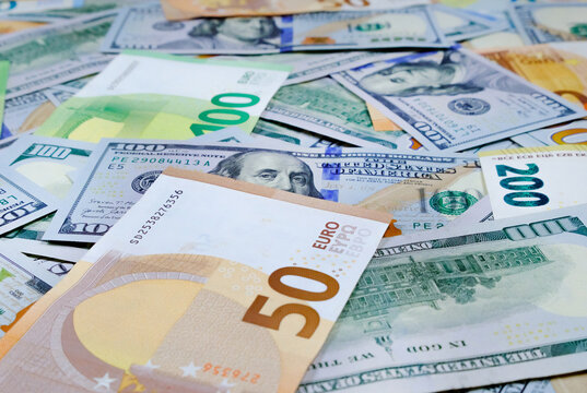 Money. Euro and us dollars banknotes. Background of dollars and european currency