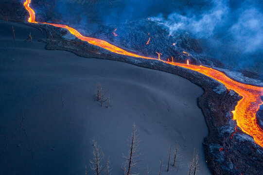 Aerial view of Cumbre Vieja volcano during an eruption with magma and lava in La Palma island, Canary Islands, Spain.